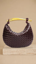 Alejandra – Bolso trenzado con asa dorada